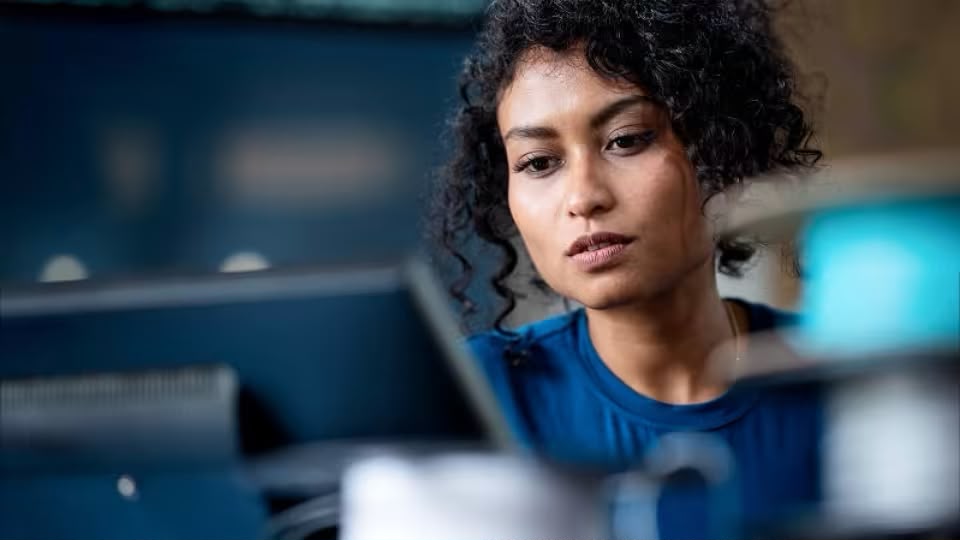 Lady looking at a screen
